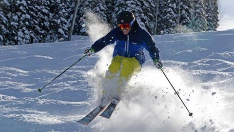 Olympian Nelson Carmichael going down a mogul run at Steamboat Resort.