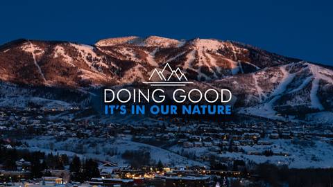 Doing Good logo with a scenic mountain backdrop.