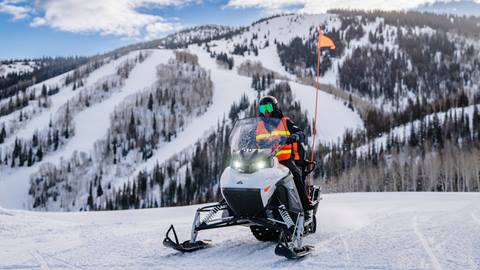 A Steamboat Resort empioyee testing a Taiga Motors Corporation snowmobile.