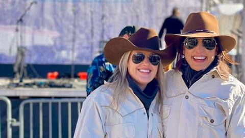 two females in cowboy hats