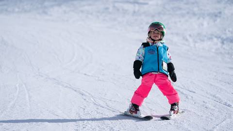 young female skier smiling 