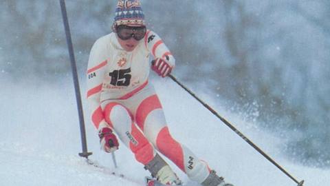 Olympian Deb Armstrong racing down the mountain.