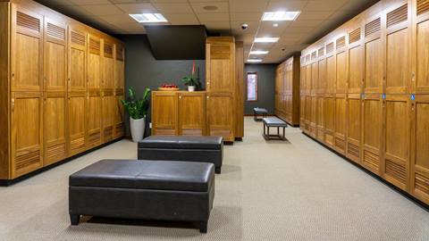 ski lockers with two sitting benches